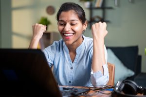 A woman is happy to have found the best credit loan company for her needs