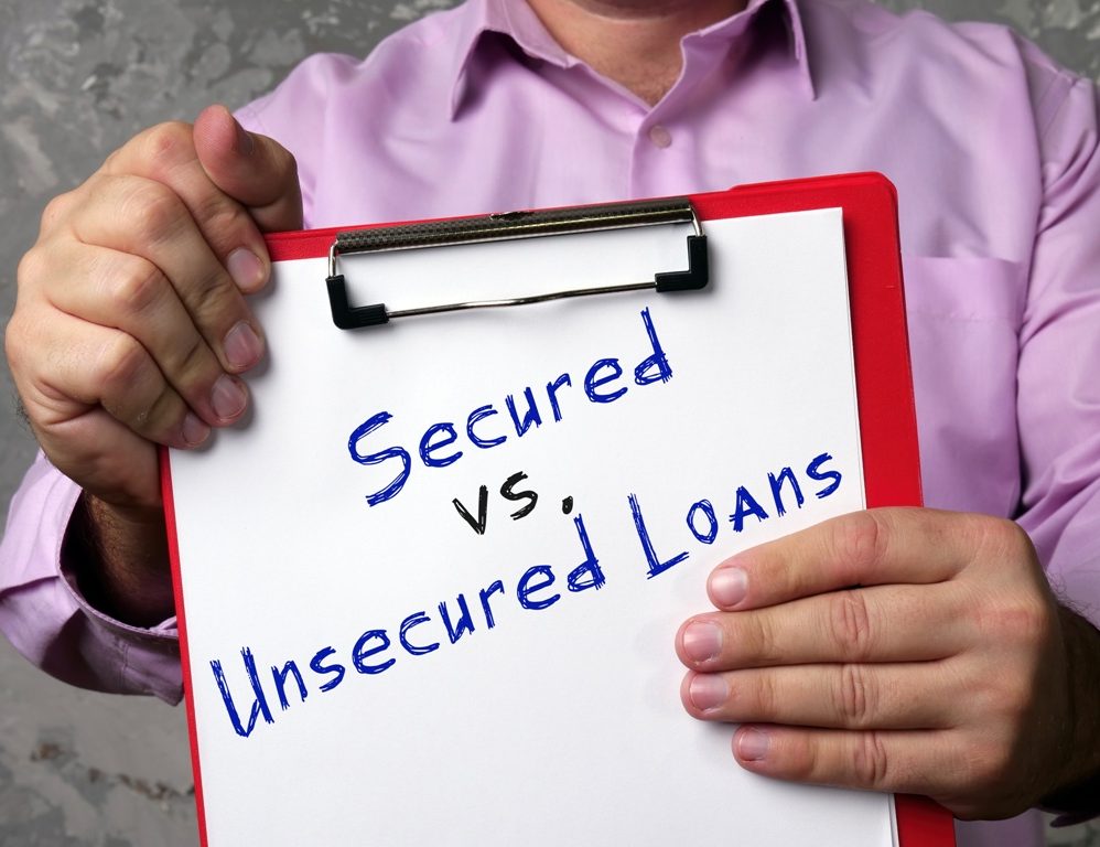 What is the difference between secured and unsecured loans?