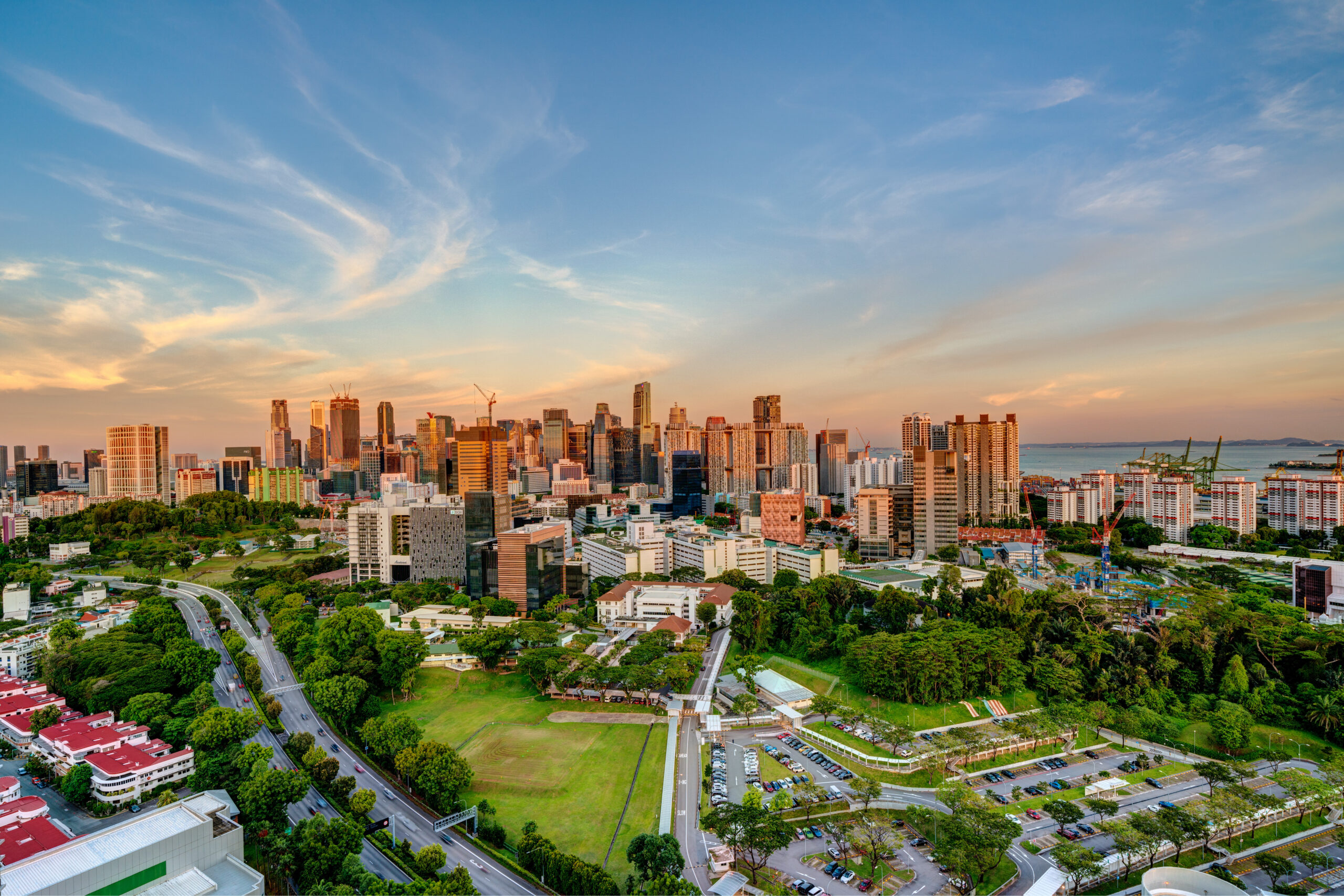 An extreme wide shot of the panoramic skyline of Singapore’s central area, namely Tiong Bahru, at dusk